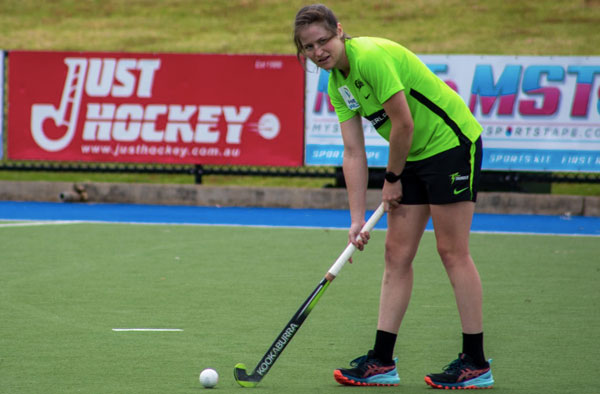 Tahlia Wilson playing hockey. PC: William Helm